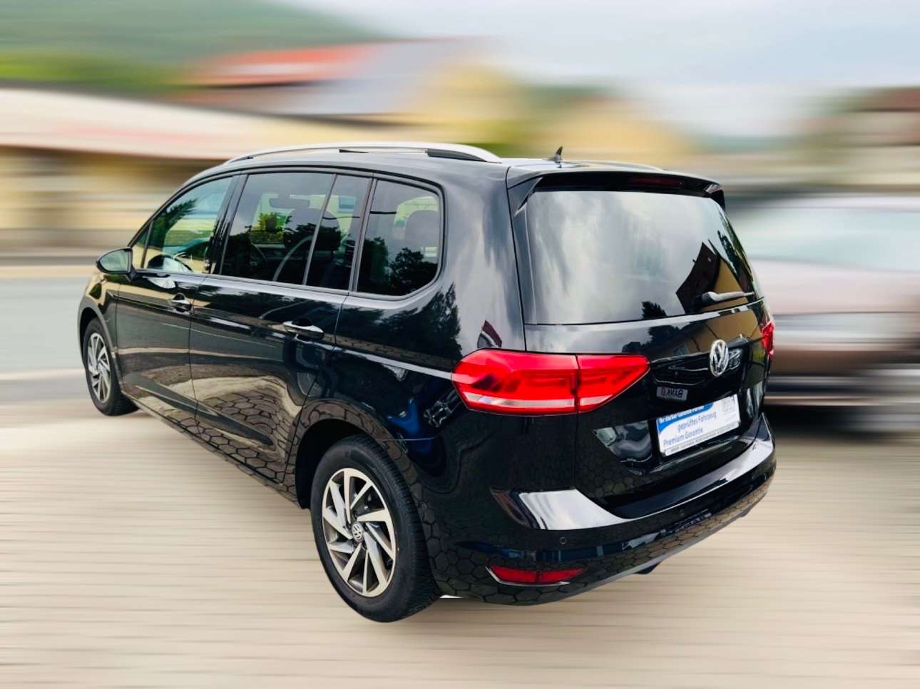 Volkswagen Touran Sound 1.2 TSI*Navi*7-Sitzer* Family Paket Bild 4