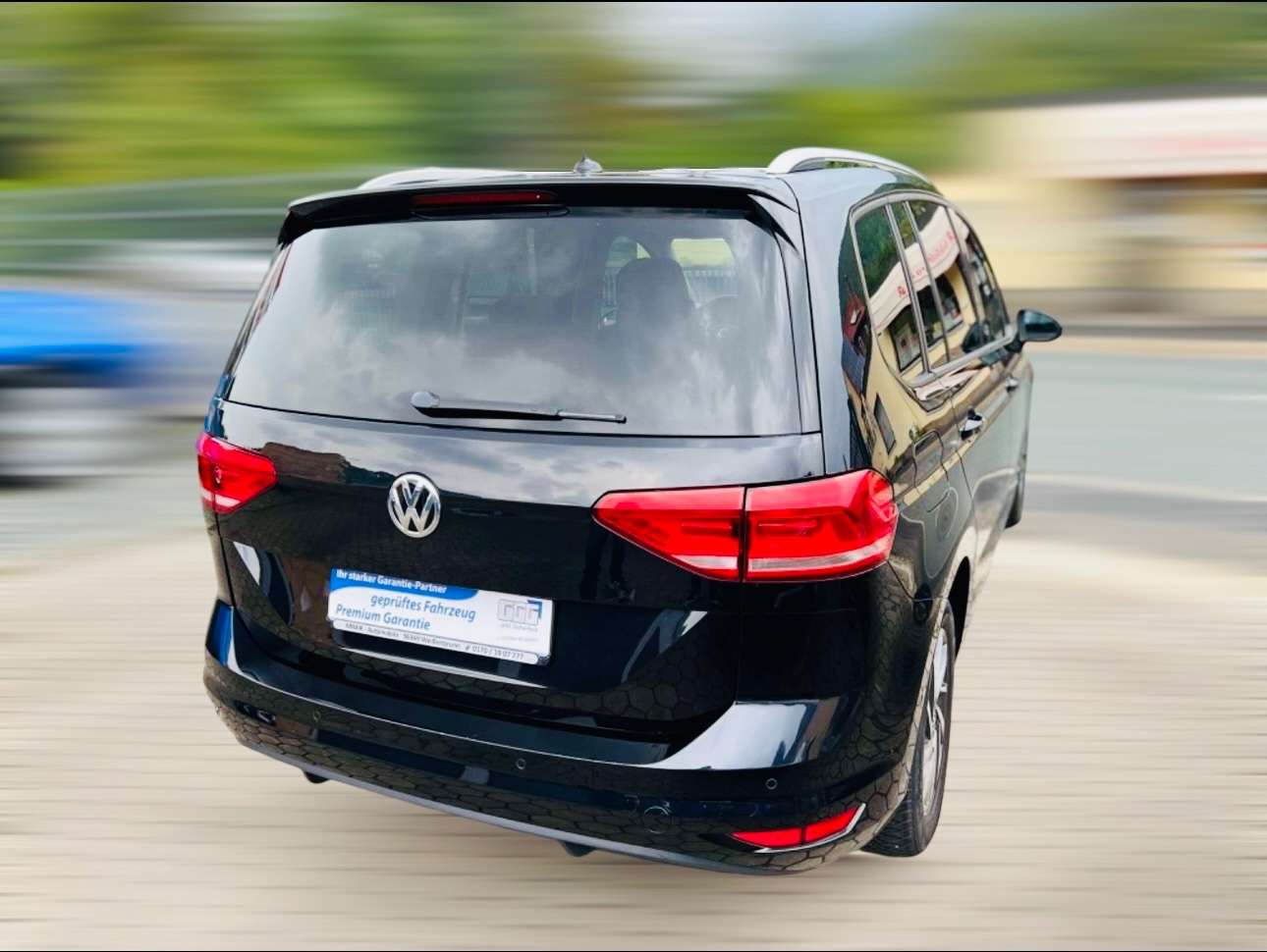 Volkswagen Touran Sound 1.2 TSI*Navi*7-Sitzer* Family Paket Bild 5