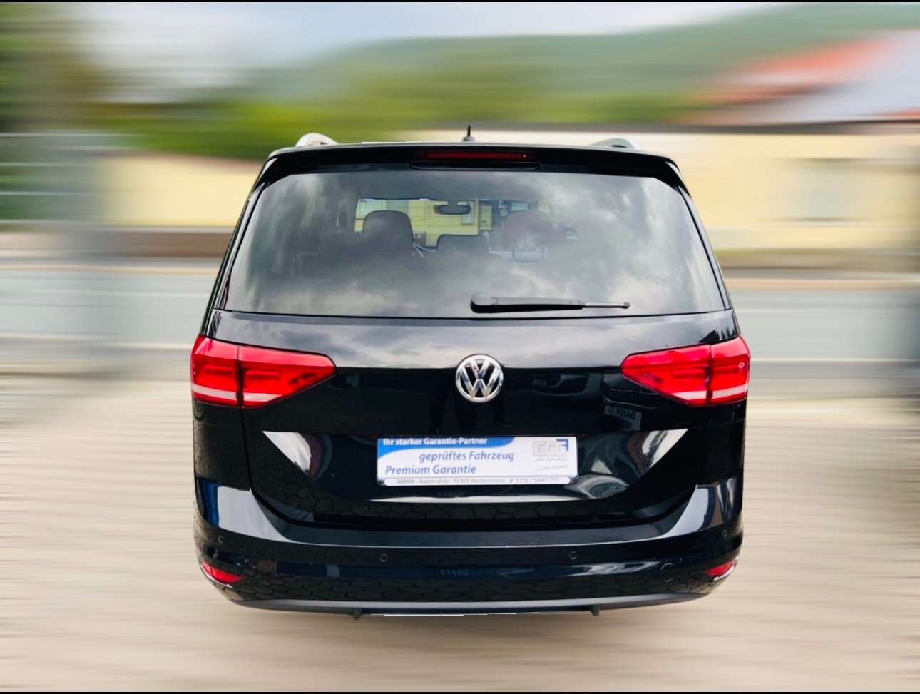 Volkswagen Touran Sound 1.2 TSI*Navi*7-Sitzer* Family Paket Bild 6