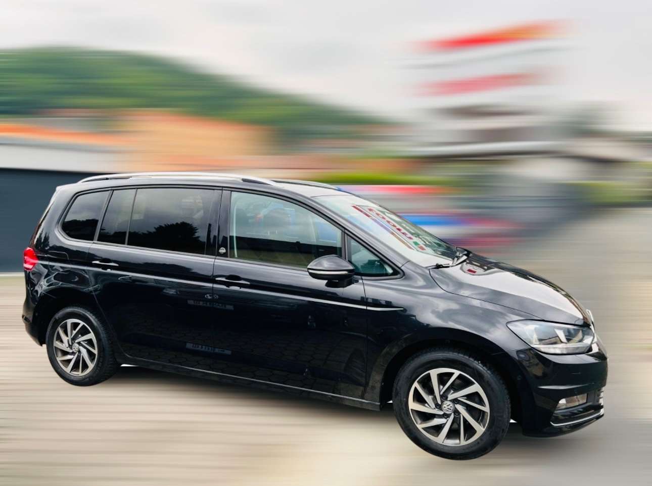 Volkswagen Touran Sound 1.2 TSI*Navi*7-Sitzer* Family Paket Bild 8